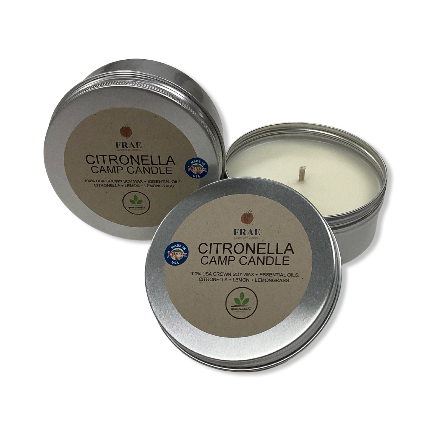 Two aluminum tins of Frae Citronella Camp Candle with one lid off showing the candle inside, and the other lid off displaying the label with brand and product information.